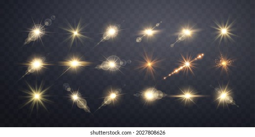 Gold lens flares set.
Isolated on transparent background. Sun flash with rays or gold spotlight and bokeh. Yellow glow flare light effect. Vector illustration.