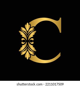 Gold letter C Vintage golden flower ornament initial letters.  Alphabet. Logo vector 