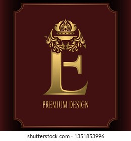 Gold Letter E with Crown. Graceful Royal Style. Calligraphic Beautiful Logo. Vintage Drawn Emblem for Book Design, Brand Name, Business Card, Restaurant, Boutique, Crest, Hotel. Vector illustration