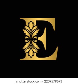 Gold letter E Vintage golden flower ornament initial letters.  Alphabet. Logo vector 