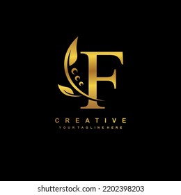 gold letter F logo with luxury gold leaf ornament. F flourish, monogram, typography. feather logo. F premium design. suitable for company logo, business, boutique, wedding, celebration, etc