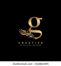 gold letter G logo design with luxury and beautiful ornaments. G Monogram. G typography. golden feather logo