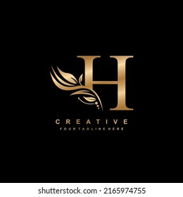 gold letter H logo design with luxurious and beautiful leaf ornament. H Monogram. H typography. gold feather logo. initial letter H logo