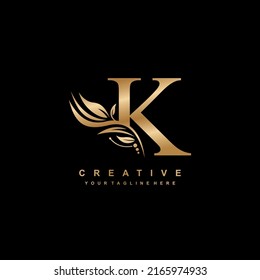 gold letter K logo design with luxurious and beautiful leaf ornament. K Monogram. K typography. gold feather logo. initial letter K logo