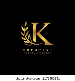 gold letter K logo design with luxurious and beautiful leaf ornament. K Monogram. K typography. gold feather logo. initial letter K logo. golden flower logo. Suitable for boutique, wedding, hotel, etc