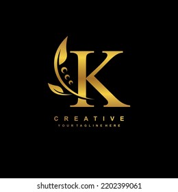 gold letter K logo with luxury gold leaf ornament. K flourish, monogram, typography. feather logo. K premium design. suitable for company logo, business, boutique, wedding, celebration, etc