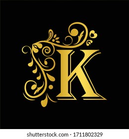 Gold letter K. Vintage golden flower ornament initial letters.  Alphabet. Logo vector 