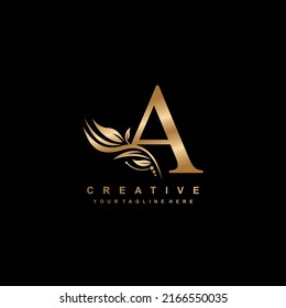 gold letter A logo design with luxurious and beautiful leaf ornament. A Monogram. A typography. gold feather logo. initial letter A logo