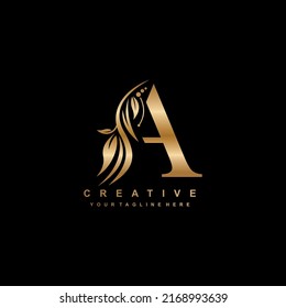 gold A letter logo design with luxurious and beautiful leaf ornament. A Monogram. typography. gold feather logo. initial letter logo. suitable for business logo, hotel, boutique, wedding, etc