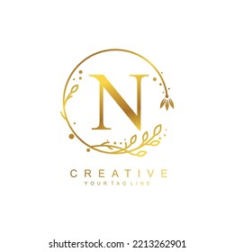 
Gold letter N logo design with circular flower and leaf ornament. the letter N design is beautiful and luxurious. monogram typography N. suitable for logos of beauty, business, company, promotion etc