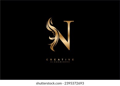 gold letter N logo design with graceful and elegant flower, leaf, feather ornaments. monogram N. typography N. logo N initial. Suitable for, business, wedding, boutique, company, hotel, beauty etc.