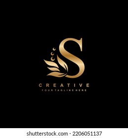 gold letter S logo design with flourish ornaments. logo S with floral and leaf ornaments. S beautiful logo. luxury letter S logo design