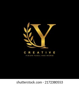 gold letter Y logo design with luxurious and beautiful leaf ornament. Y Monogram. Y typography. gold feather logo. initial letter Y logo. golden flower logo. Suitable for boutique, wedding, hotel, etc