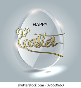 Gold lettering on a glass Easter egg. Capital letters. Happy easter.
