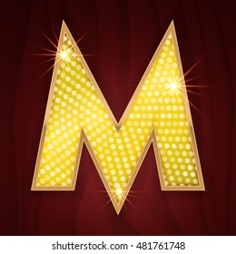 Gold light lamp bulb letter M for burlesque style sparkling design