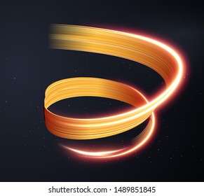 Gold light trail effect on black background. Magic light. Gold glowing neon line. Glowing swirl light effect.