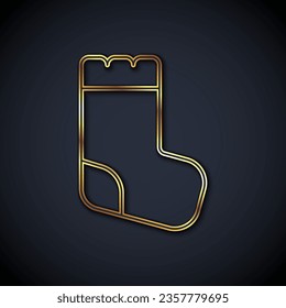 Gold line Baby socks clothes icon isolated on black background.  Vector