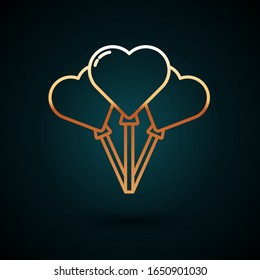 Gold line Balloons in form of heart with ribbon icon isolated on dark blue background.  Vector Illustration
