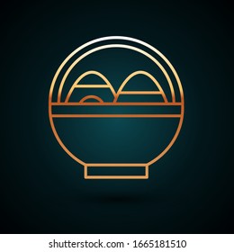 Gold line Basket with easter eggs icon isolated on dark blue background. Happy Easter.  Vector Illustration