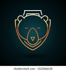 Gold line Bear head on shield icon isolated on dark blue background. Hunting trophy on wall.  Vector Illustration