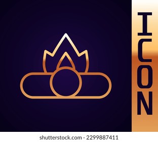 Gold line Campfire icon isolated on black background. Burning bonfire with wood.  Vector