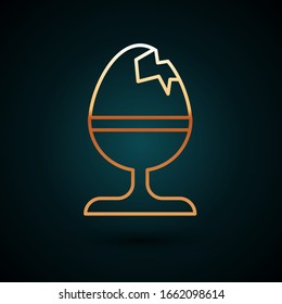 Gold line Chicken egg on a stand icon isolated on dark blue background. Happy Easter.  Vector Illustration
