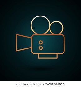 Gold line Cinema camera icon isolated on dark blue background. Video camera. Movie sign. Film projector.  Vector