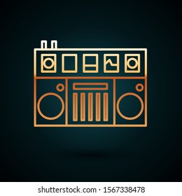 Gold line DJ remote for playing and mixing music icon isolated on dark blue background. DJ mixer complete with vinyl player and remote control.  Vector Illustration