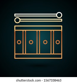 Gold line Drum with drum sticks icon isolated on dark blue background. Music sign. Musical instrument symbol.  Vector Illustration