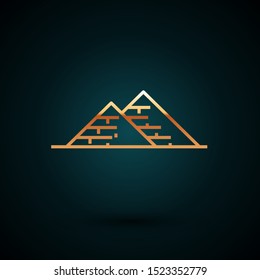 Gold line Egypt pyramids icon isolated on dark blue background. Symbol of ancient Egypt.  Vector Illustration