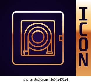 Gold line Fire hose cabinet icon isolated on black background.  Vector Illustration