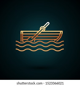 Gold line Fishing boat with oars on water icon isolated on dark blue background.  Vector Illustration