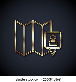 Gold line Folded map with location marker icon isolated on black background.  Vector