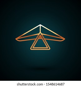 Gold line Hang glider icon isolated on dark blue background. Extreme sport.  Vector Illustration