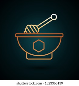 Gold line Honey dipper stick and bowl icon isolated on dark blue background. Honey ladle.  Vector Illustration