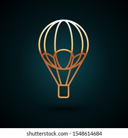 Gold line Hot air balloon icon isolated on dark blue background. Air transport for travel.  Vector Illustration