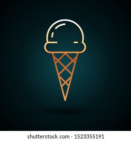Gold line Ice cream in waffle cone icon isolated on dark blue background. Sweet symbol.  Vector Illustration
