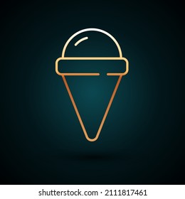 Gold line Ice cream in waffle cone icon isolated on dark blue background. Sweet symbol.  Vector