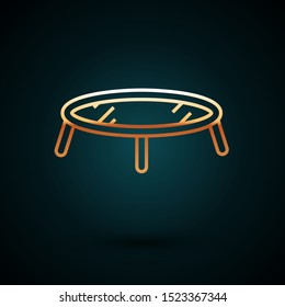 Gold line Jumping trampoline icon isolated on dark blue background.  Vector Illustration