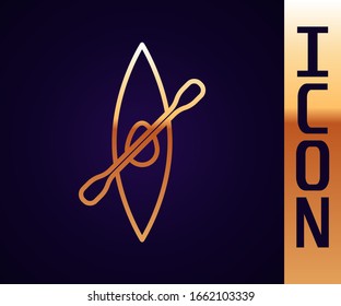 Gold line Kayak and paddle icon isolated on black background. Kayak and canoe for fishing and tourism. Outdoor activities.  Vector Illustration