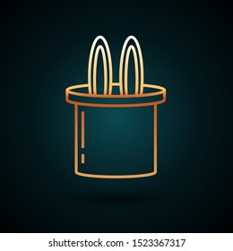 Gold line Magician hat and rabbit ears icon isolated on dark blue background. Magic trick. Mystery entertainment concept.  Vector Illustration