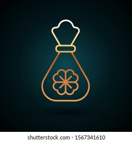 Gold line Money bag with four leaf clover icon isolated on dark blue background. Cash Banking currency sign. Happy Saint Patricks day.  Vector Illustration