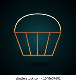 Gold line Muffin icon isolated on dark blue background.  Vector Illustration