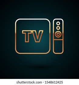 Gold line Multimedia and TV box receiver and player with remote controller icon isolated on dark blue background.  Vector Illustration