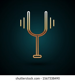 Gold line Musical tuning fork for tuning musical instruments icon isolated on dark blue background.  Vector Illustration
