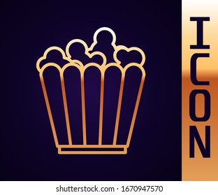 Gold line Popcorn in cardboard box icon isolated on black background. Popcorn bucket box.  Vector Illustration