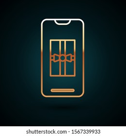 Gold line Smartphone with gift box on the screen icon isolated on dark blue background. Merry Christmas and Happy New Year.  Vector Illustration