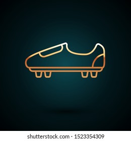 Gold line Soccer or football shoes with spikes icon isolated on dark blue background. American football boot.  Vector Illustration