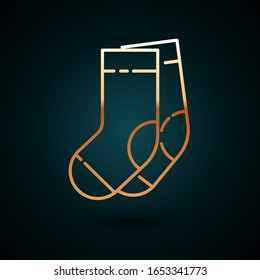 Gold line Socks icon isolated on dark blue background.  Vector Illustration