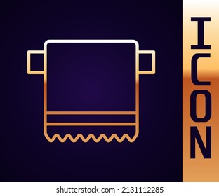 Gold line Towel on hanger icon isolated on black background. Bathroom towel icon.  Vector